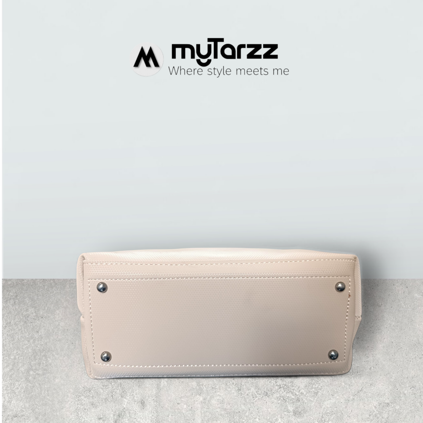 Chic Nude Perforated Tote with Tassel Charm