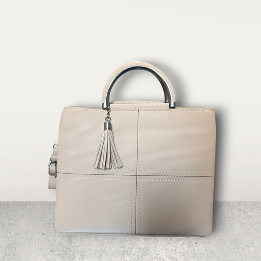 Chic Nude Perforated Tote with Tassel Charm