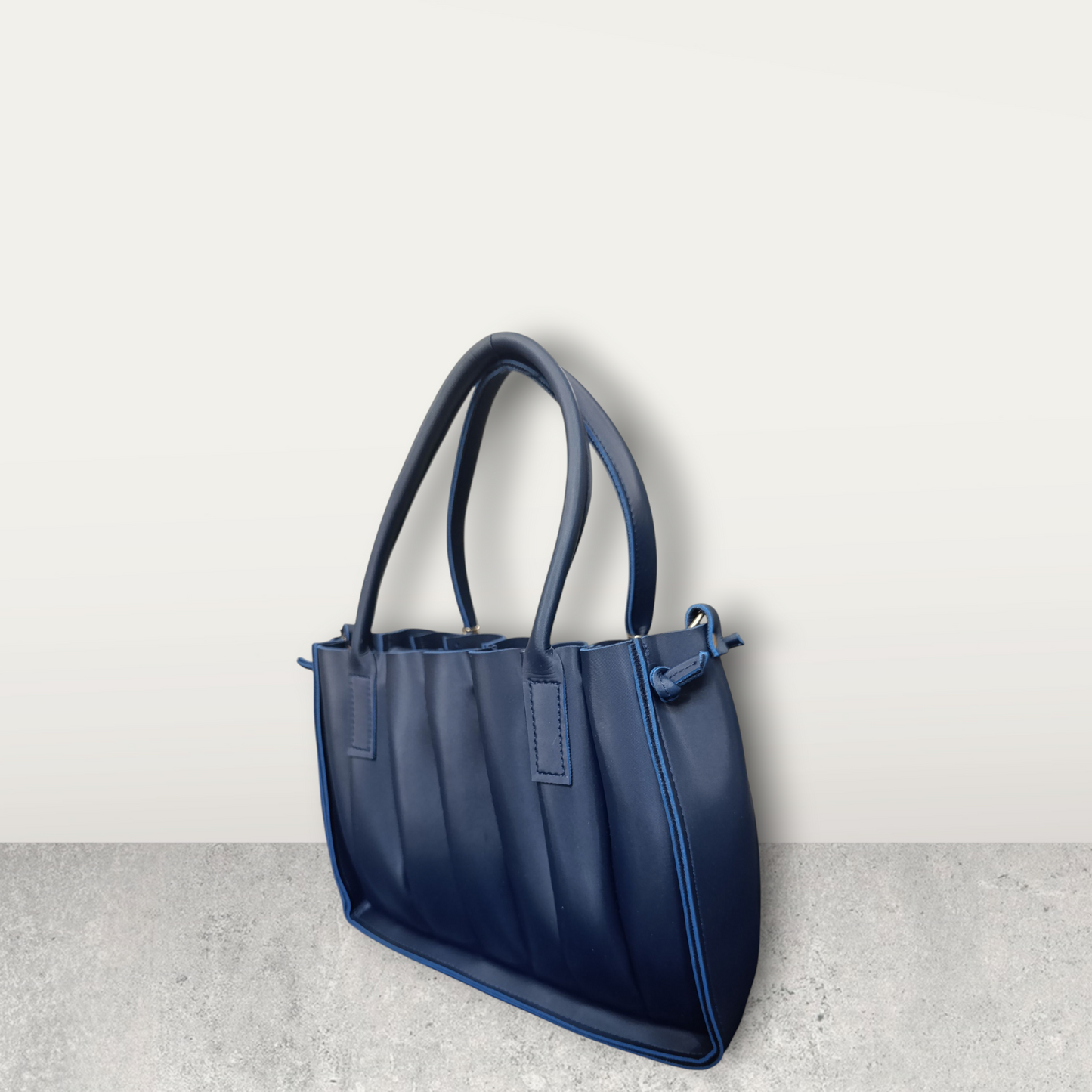 Pleated Midnight Blue Tote with Pom Pom Charm