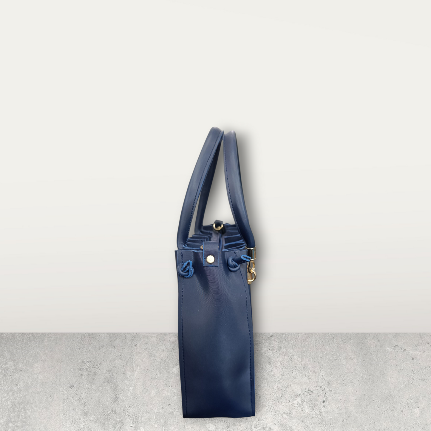 Pleated Midnight Blue Tote with Pom Pom Charm
