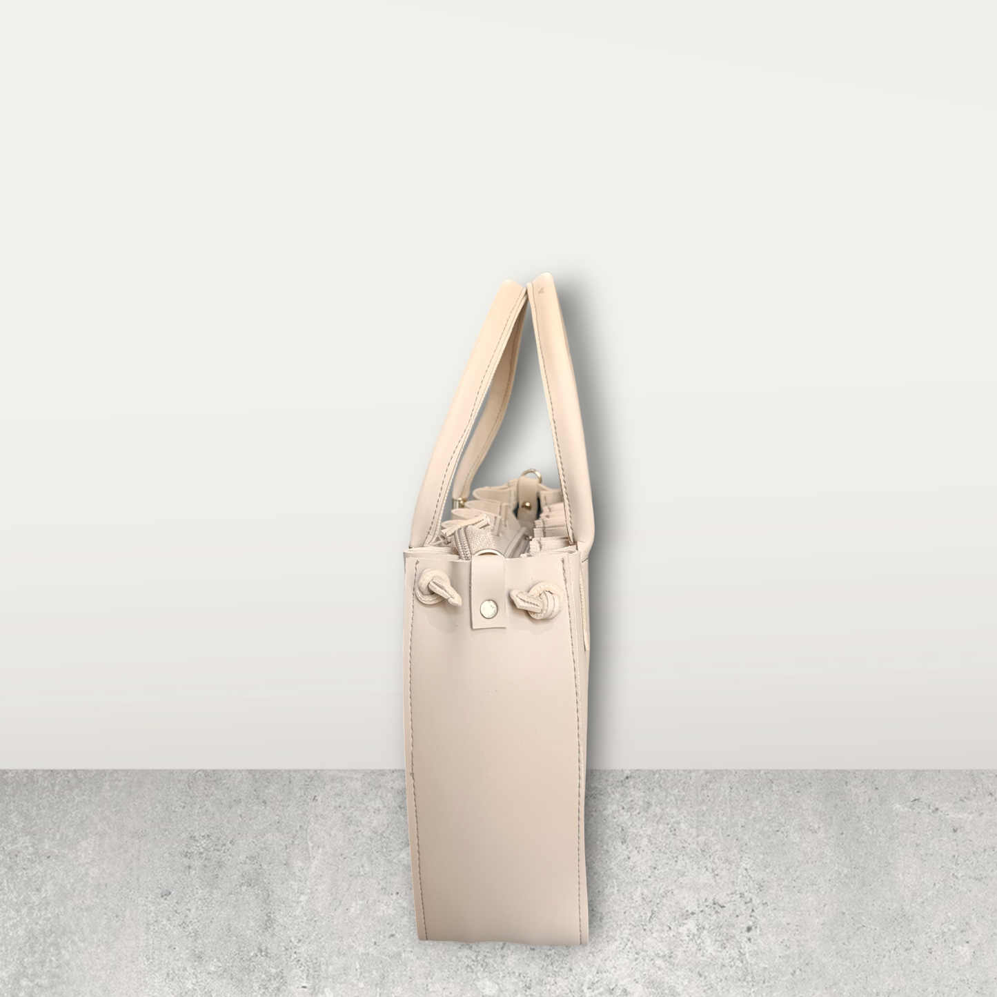 Pleated Cream Tote with Pom Pom Charm