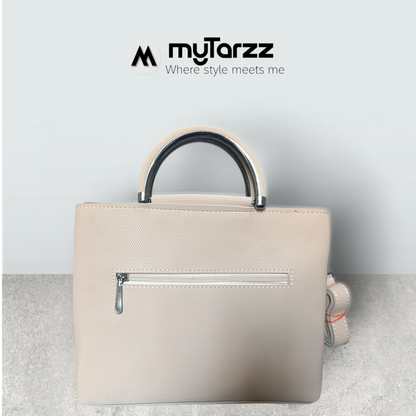 Chic Nude Perforated Tote with Tassel Charm