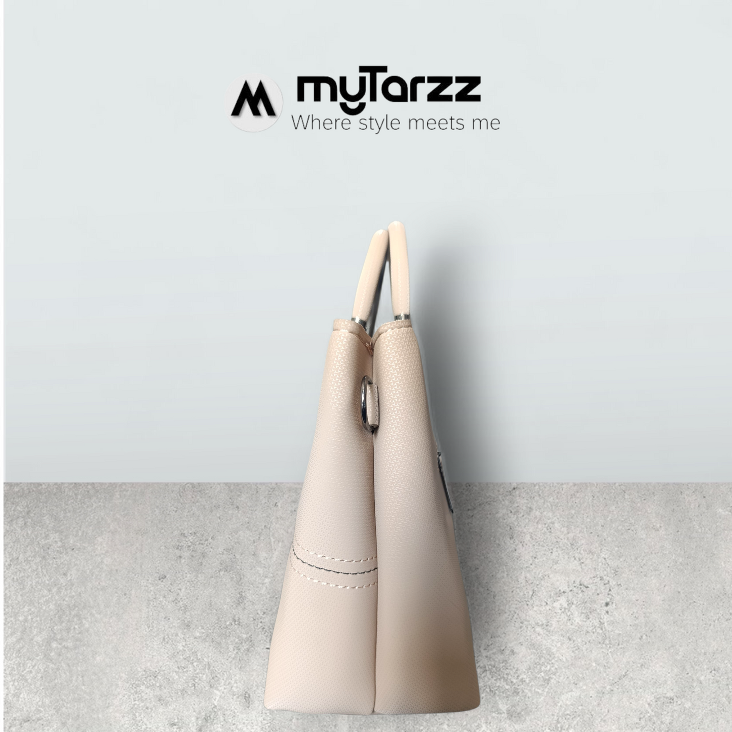 Chic Nude Perforated Tote with Tassel Charm