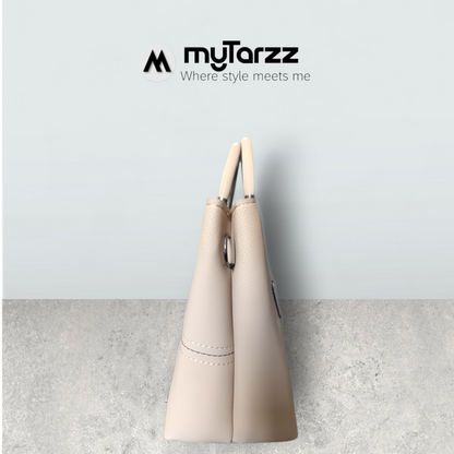 Chic Nude Perforated Tote with Tassel Charm