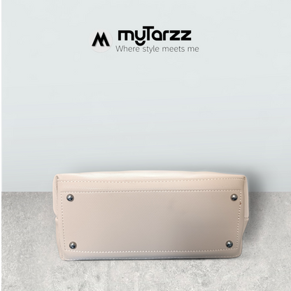 Chic Nude Perforated Tote with Tassel Charm