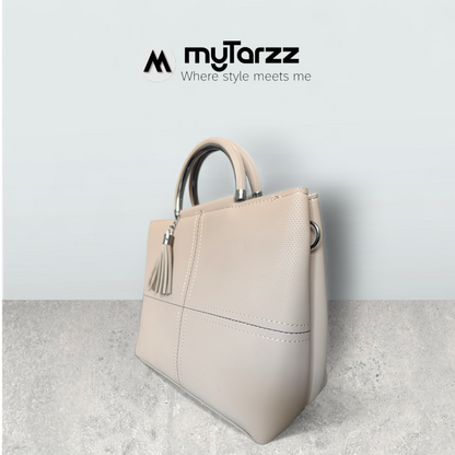 Chic Nude Perforated Tote with Tassel Charm